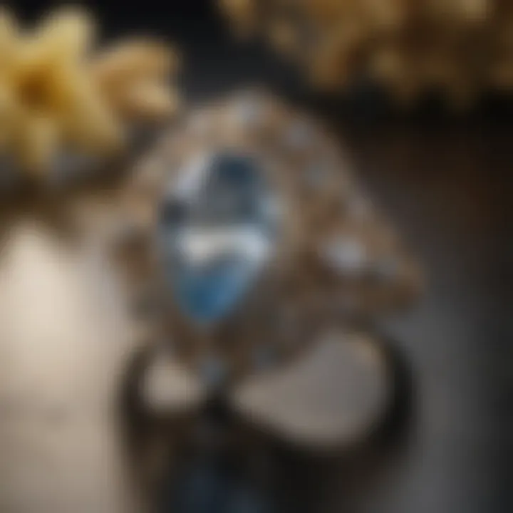 Classic vintage-inspired setting for pear-shaped stones with intricate detailing