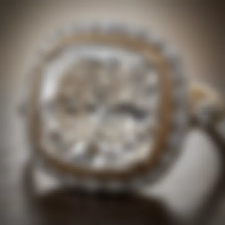 An antique jewelry piece featuring an old mine cushion cut diamond