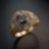 A vintage antique ring displayed elegantly on a dark velvet background.