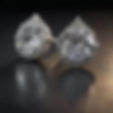 Close-up view of sparkling diamond stud earrings on a velvet background.