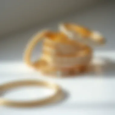 Collection of diverse round diamond thin gold bands arranged artfully