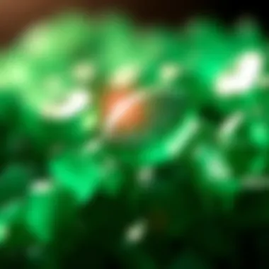 A close-up view of emerald green crystals reflecting light