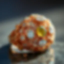 Close-up of an intricate vintage anniversary ring featuring floral patterns and gemstones