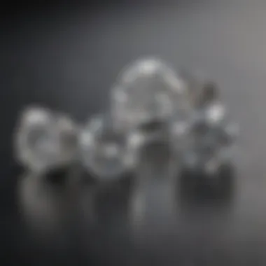 Different carat sizes of diamond studs displayed